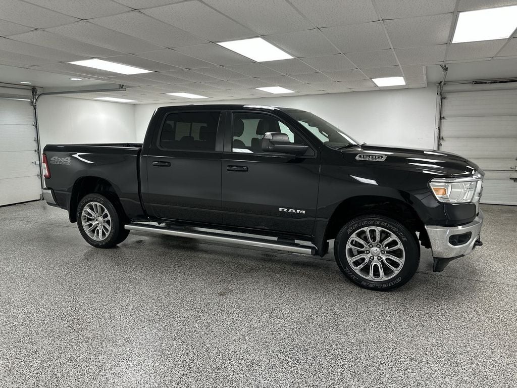 2022 RAM 1500 Big Horn in Black — front three-quarter view