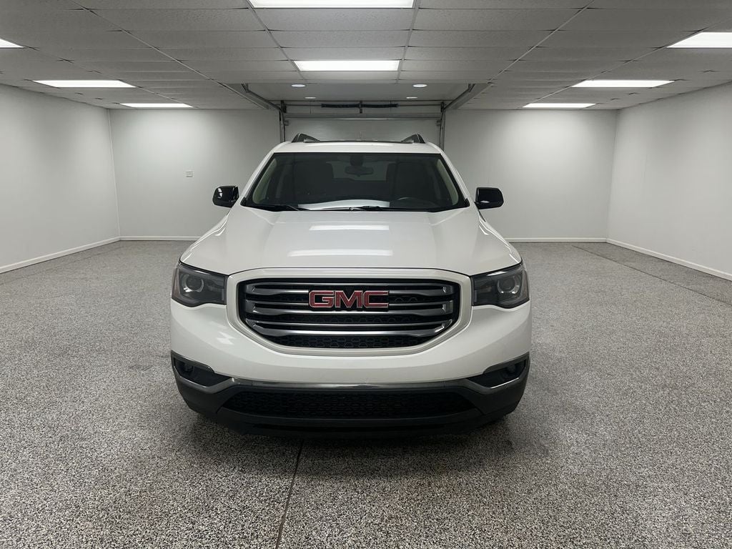 2017 GMC Acadia — rear three-quarter view