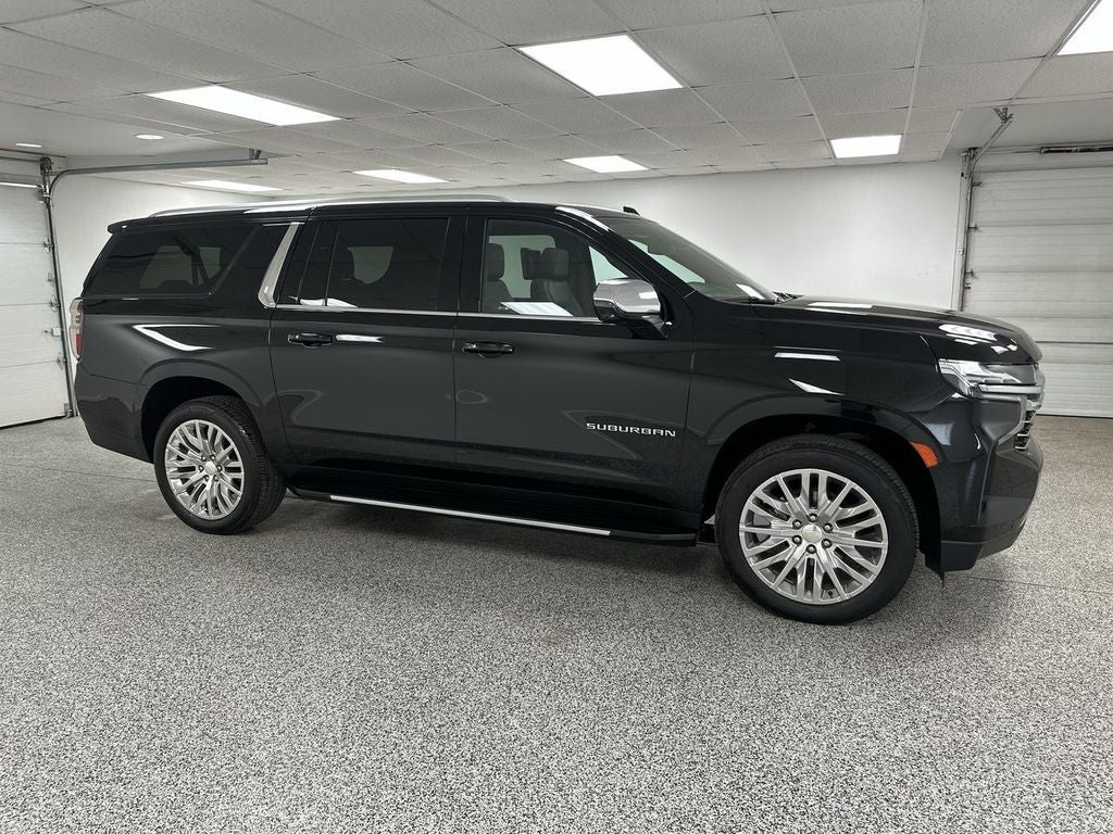 2023 Chevrolet Suburban LT in Black — front three-quarter view