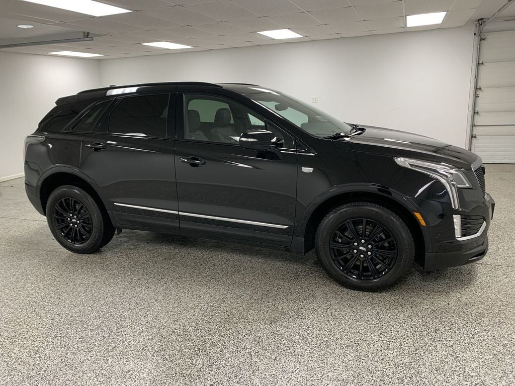 2021 Cadillac XT5 Sport in Stellar Black Metallic — front three-quarter view